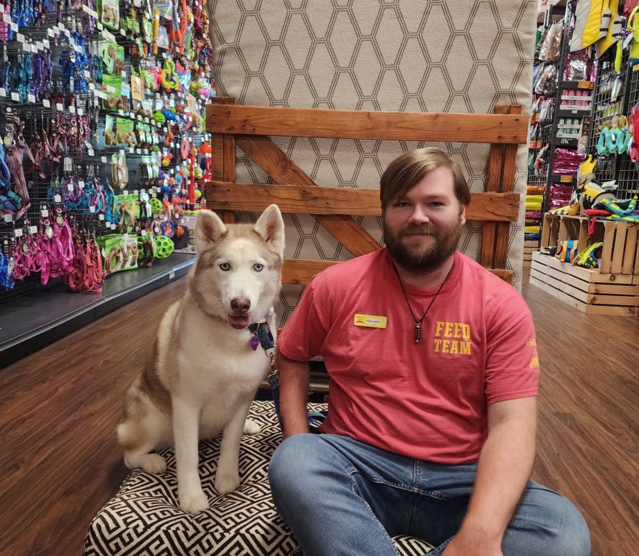 Hollywood Feed Staff sitting down with their Dog